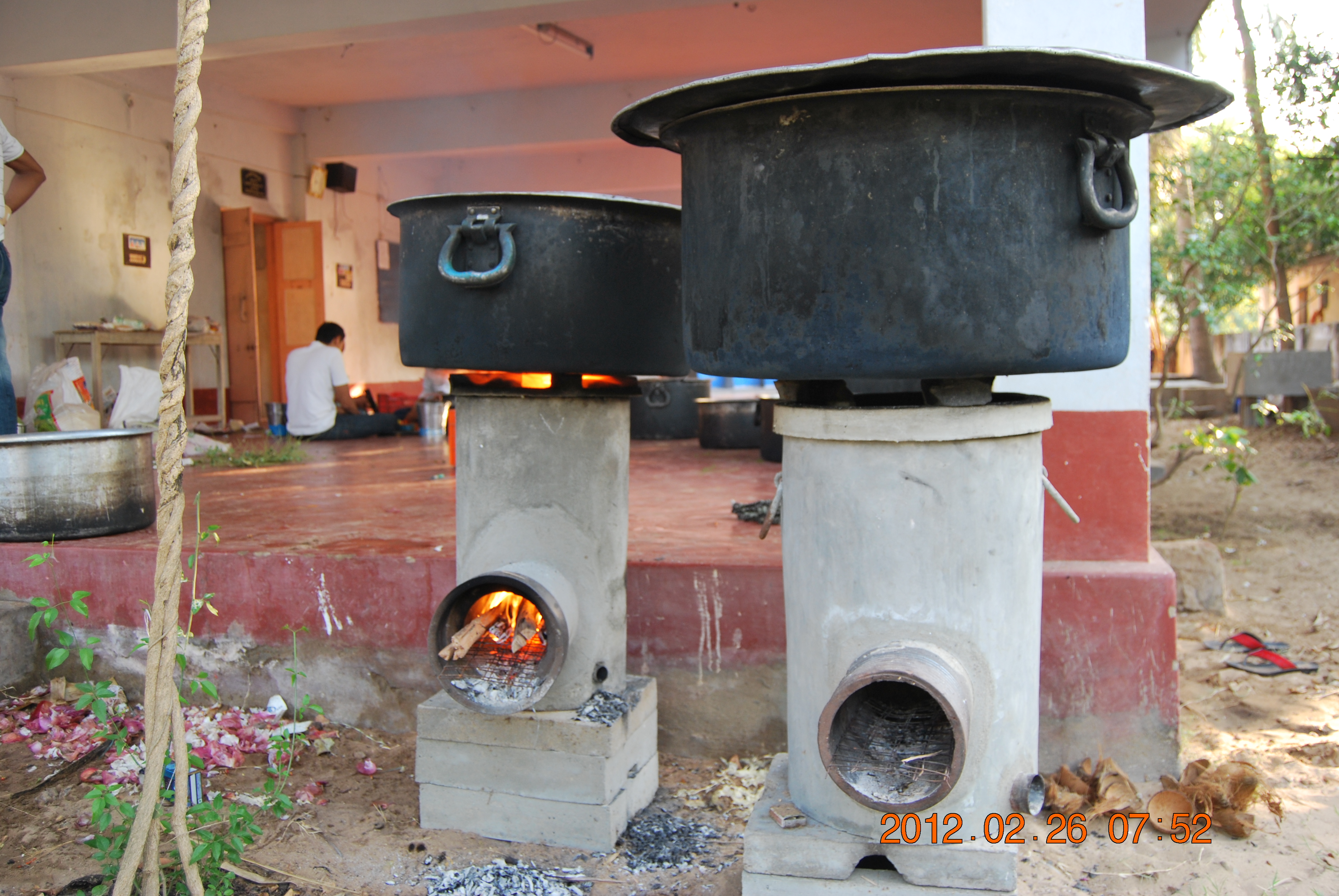 Cooking in progress. Rocket stoves designed in samithi in work.